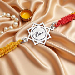 Sterling Silver “Bhai” Engraved Mandala Rakhi – Red-Yellow Thread by Jeluxa