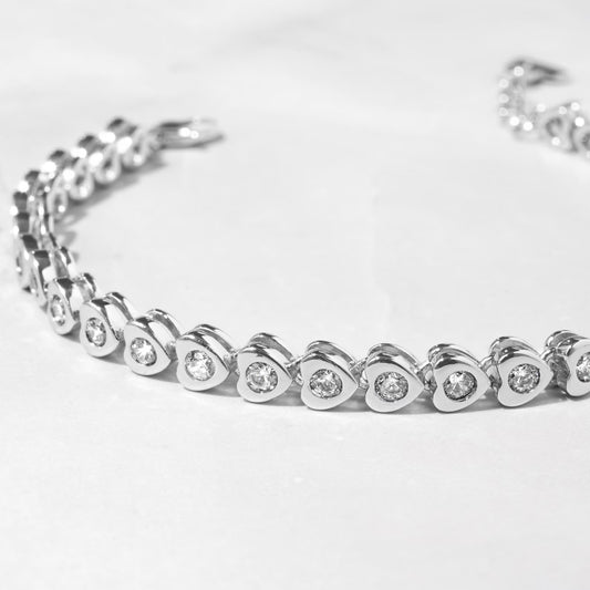 Jeluxa 18K Gold Plated Heart Tennis Bracelet with Sparkling CZ Stones